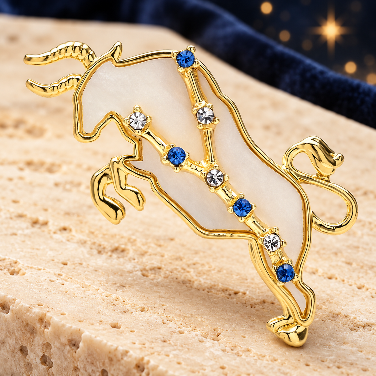 Taurus Bull with Blue Star Accents Brooch — styled background