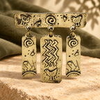 Mystic Symbols with Tassel Charms Brooch — styled background