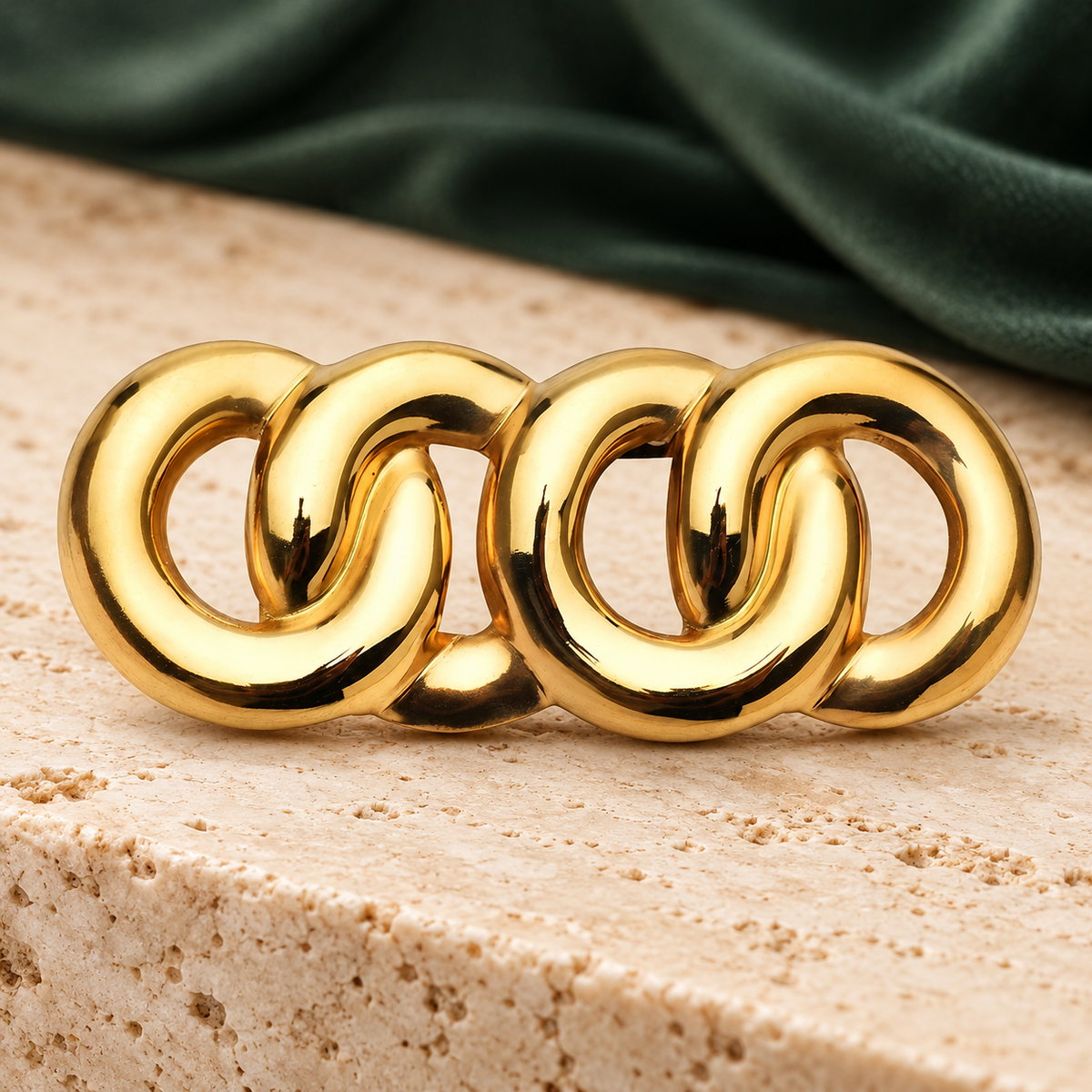 Interlocking Chain Links Brooch — styled background