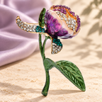 Purple Tulip Bud with Green Leaves Brooch — styled background
