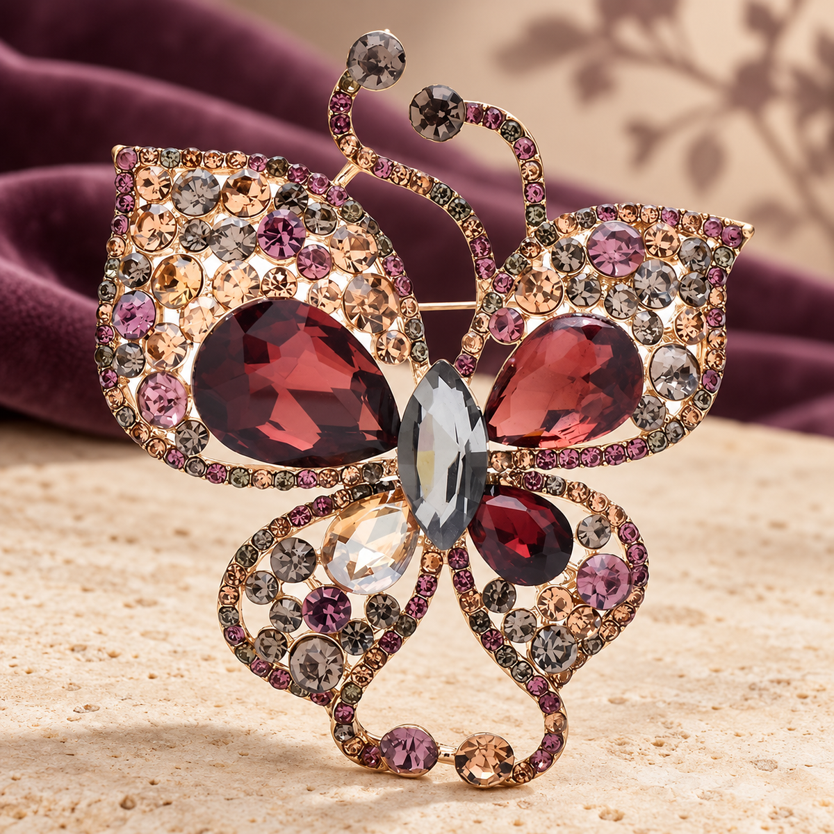 Rhinestone Swallowtail Butterfly Brooch — styled background