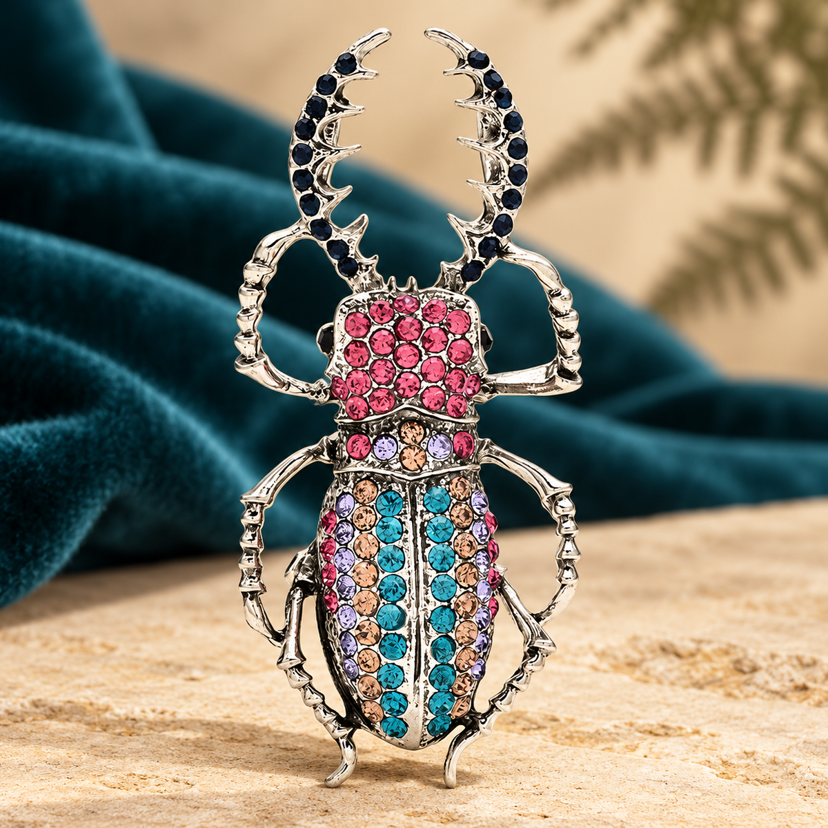Large Jeweled Beetle Brooch — styled background