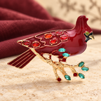 Red Cardinal on Jeweled Branch Brooch — styled background