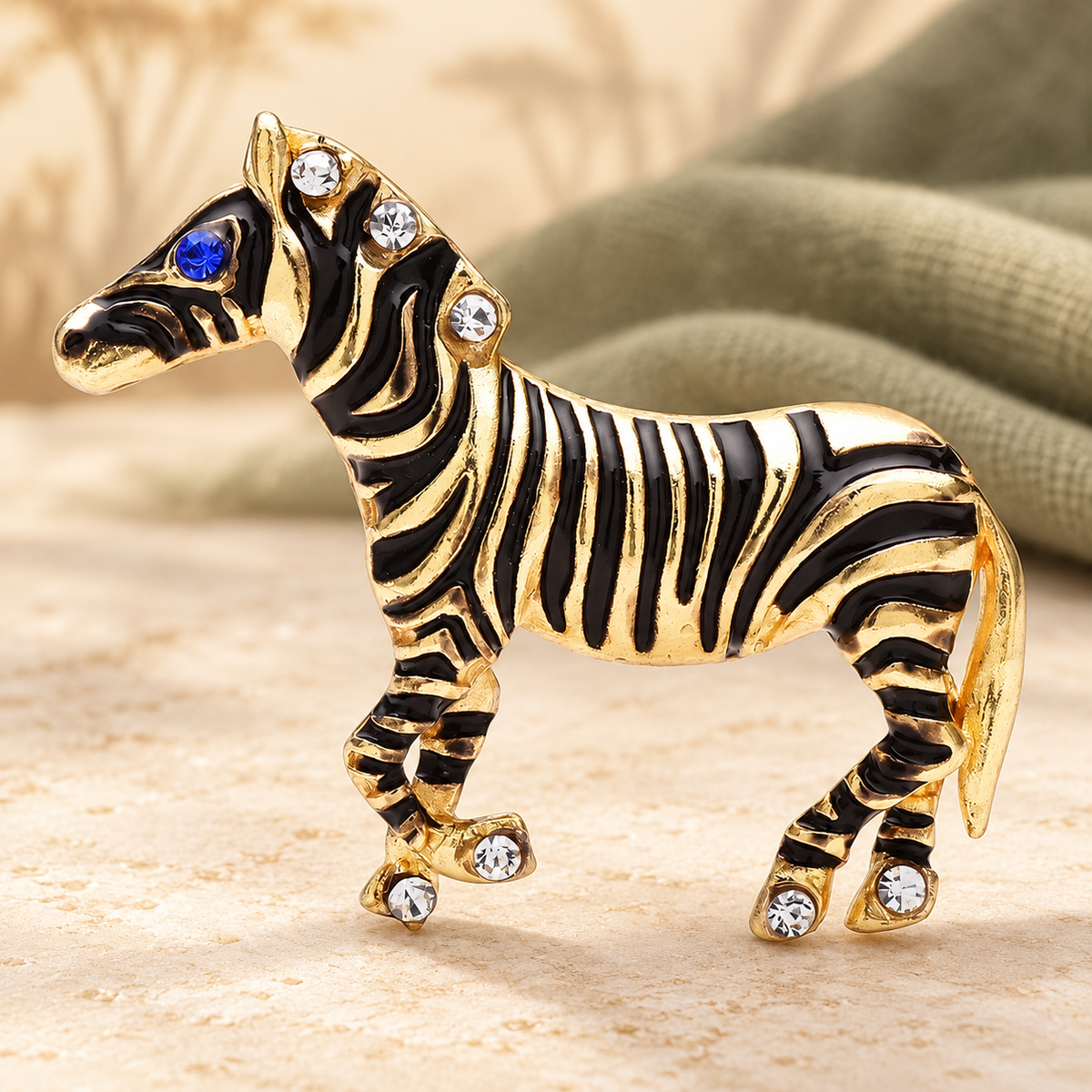 Enamel Zebra with Blue Crystal Eye Brooch — styled background