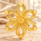 Textured Six-Petal Snowflake Brooch — styled background