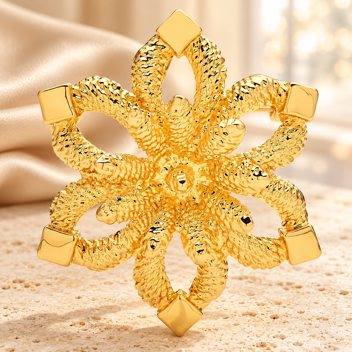 Textured Six-Petal Snowflake Brooch — styled background