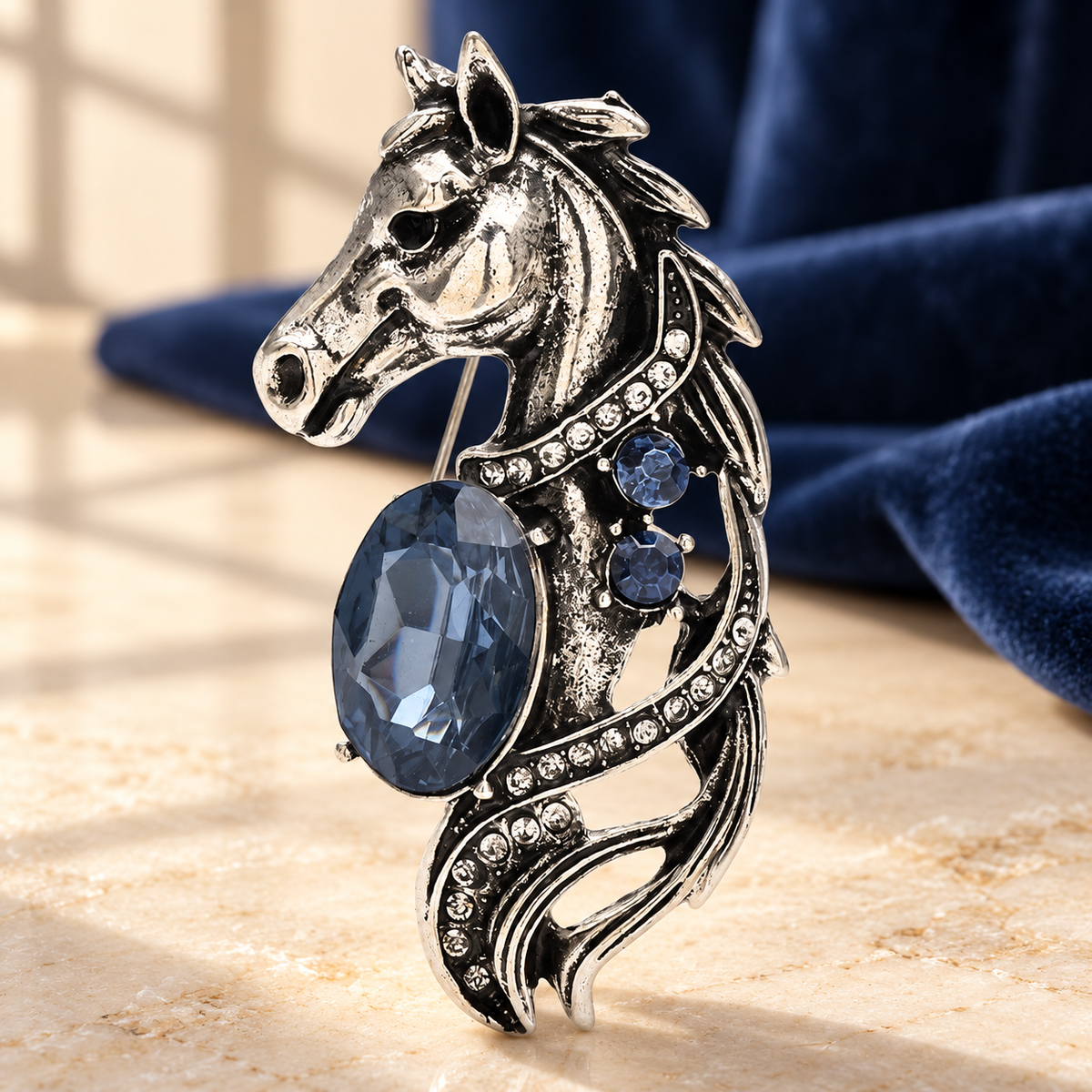 Jeweled Horse Head with Flowing Mane Brooch — styled background