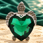Green Heart Crystal Sea Turtle Brooch — styled background