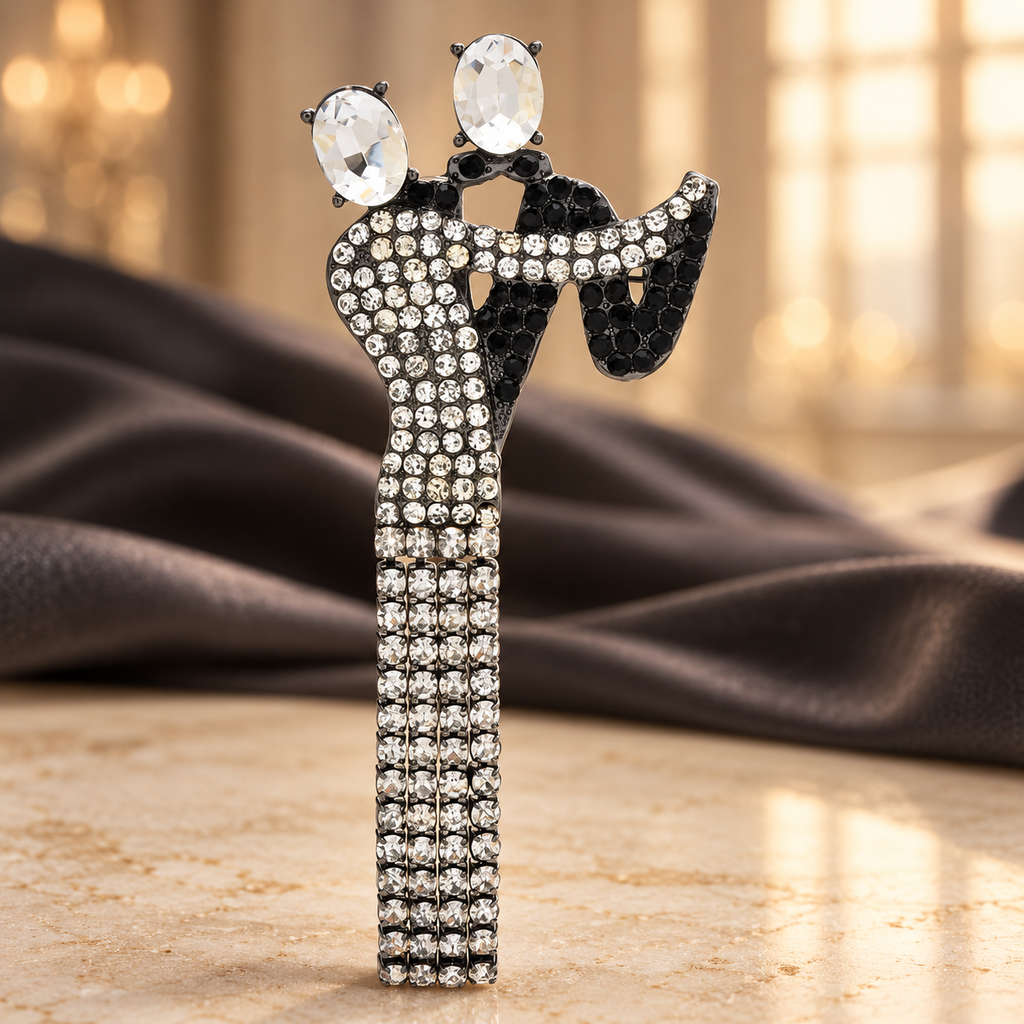 Rhinestone Dancing Couple with Tassel Brooch — styled background