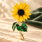 Yellow Enamel Sunflower Brooch — styled background