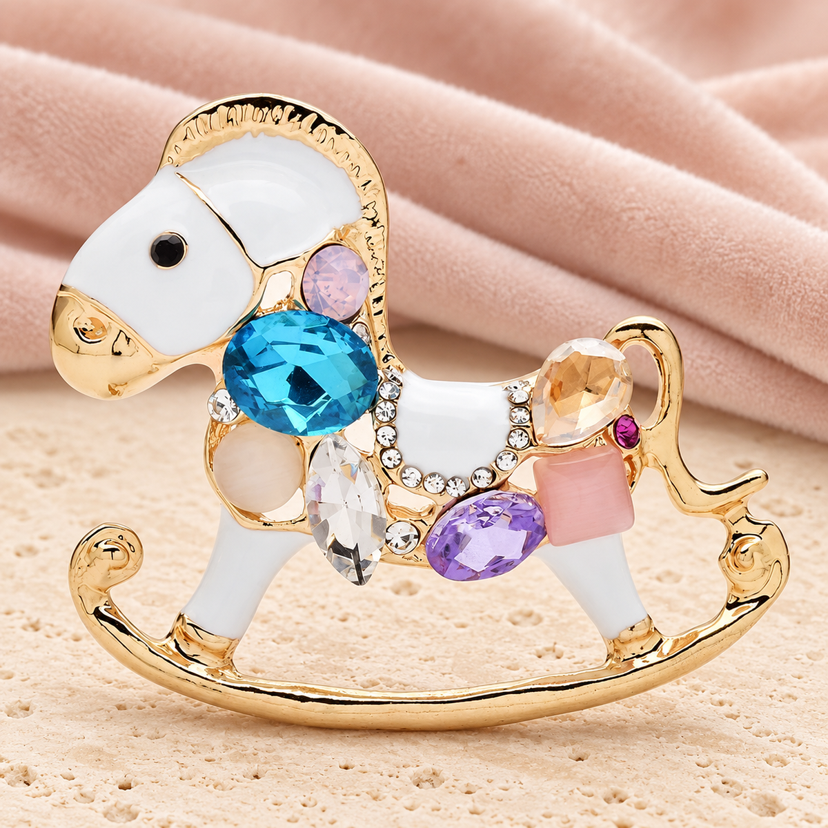 Jeweled Acrylic Rocking Horse Brooch — styled background