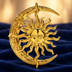 Sculptural Sun and Crescent Moon Brooch — styled background
