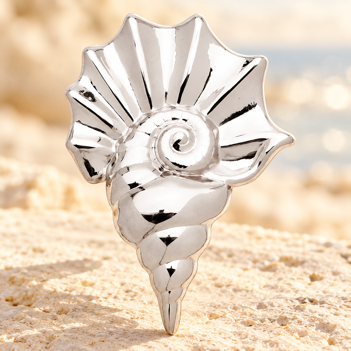 Polished Ridged Conch Shell Brooch — styled background