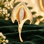 Sculptural Calla Lily with Rhinestone Center Brooch — styled background