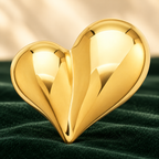 Polished Asymmetric Heart Brooch — styled background