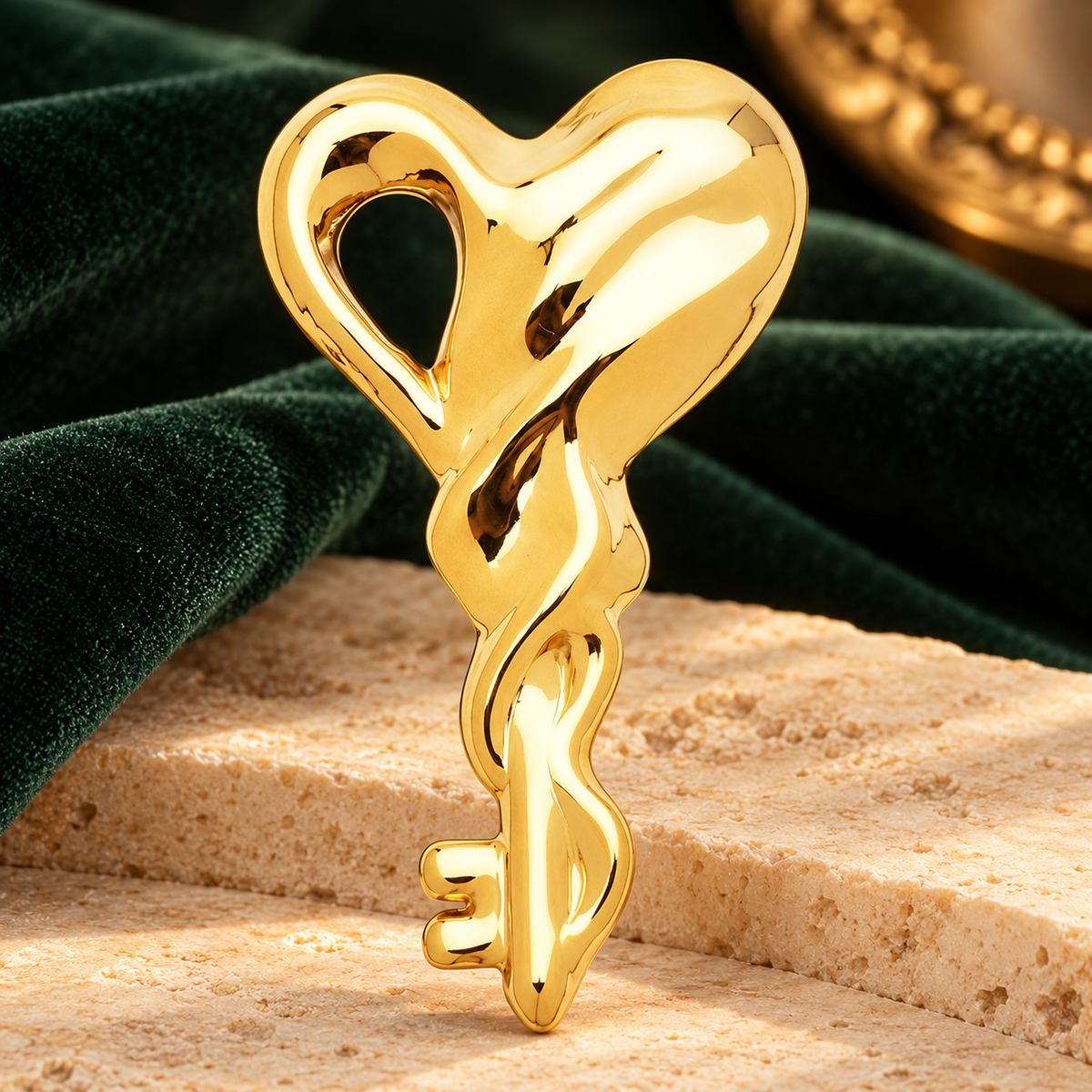 Sculptural Heart Key Stainless Steel Brooch — styled background