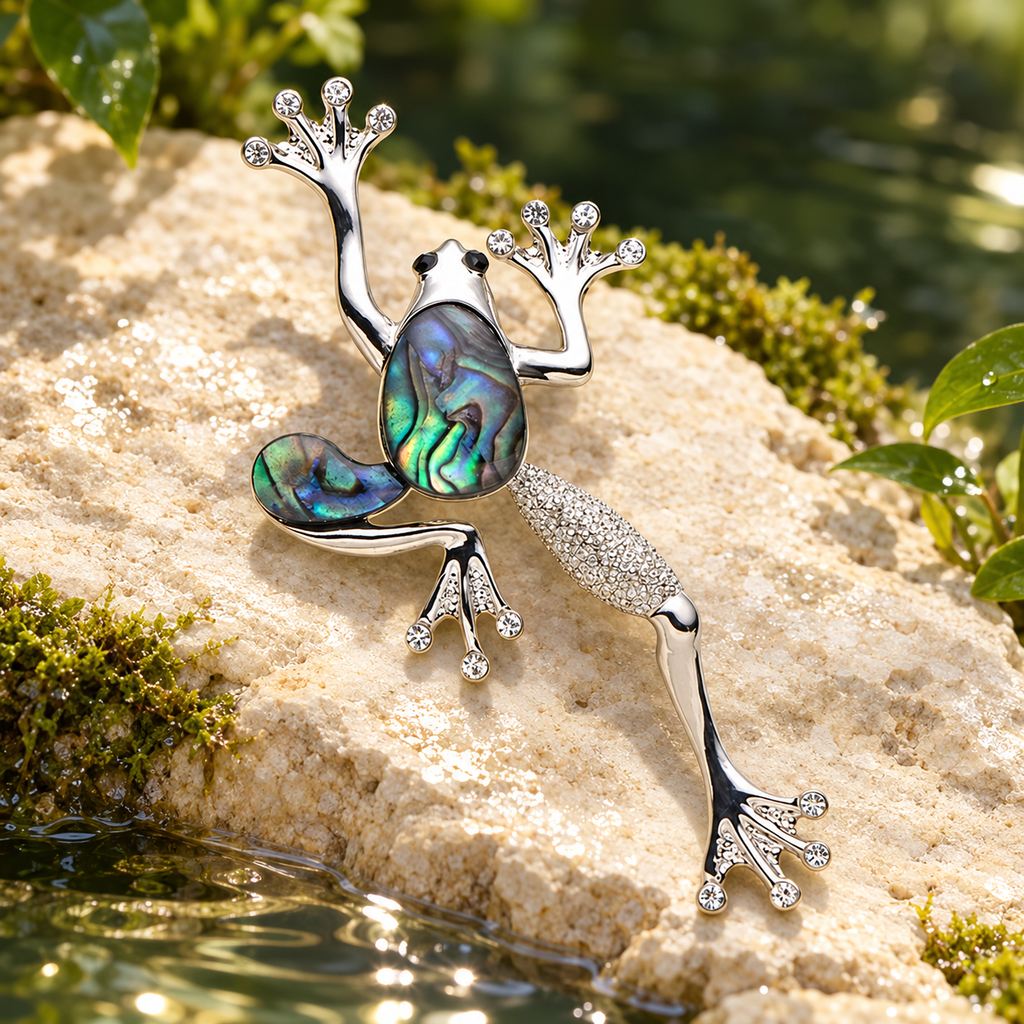 Natural Shell Climbing Frog Brooch — styled background