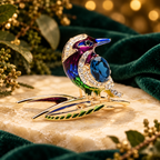 Enamel Bird Perched on a Branch Brooch — styled background