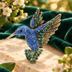 Vintage Jeweled Hummingbird in Flight Brooch — styled background