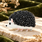 Black and White Enamel Hedgehog Brooch — styled background