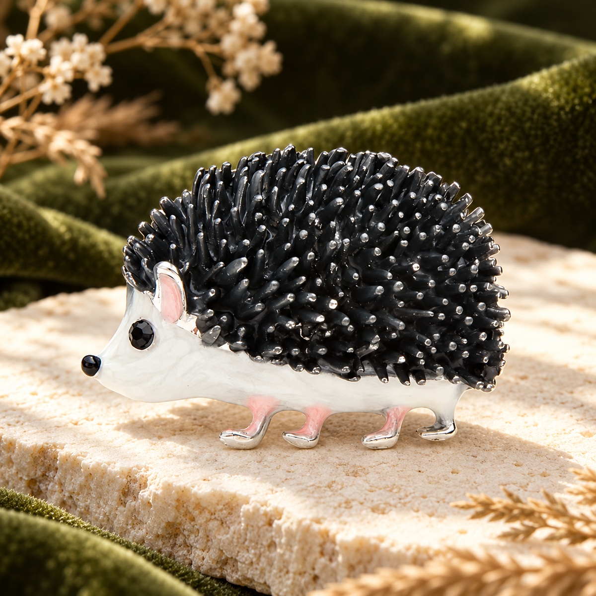 Black and White Enamel Hedgehog Brooch — styled background