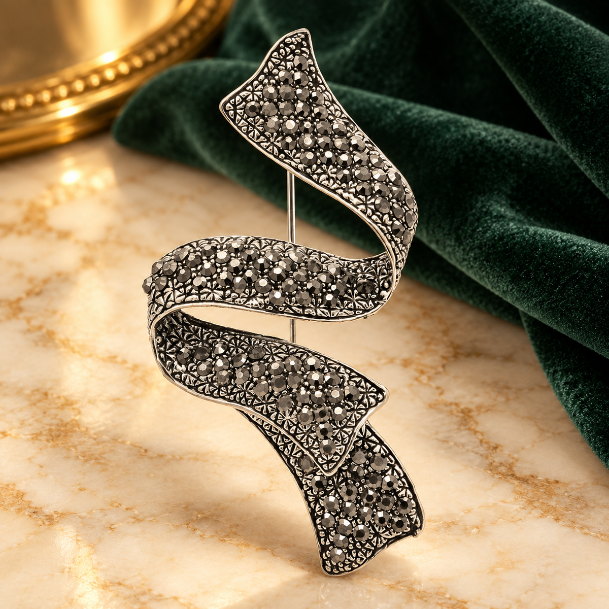 Vintage Jeweled Spiral Ribbon Brooch — styled background