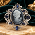 Navy Jeweled Cameo Portrait Brooch — styled background