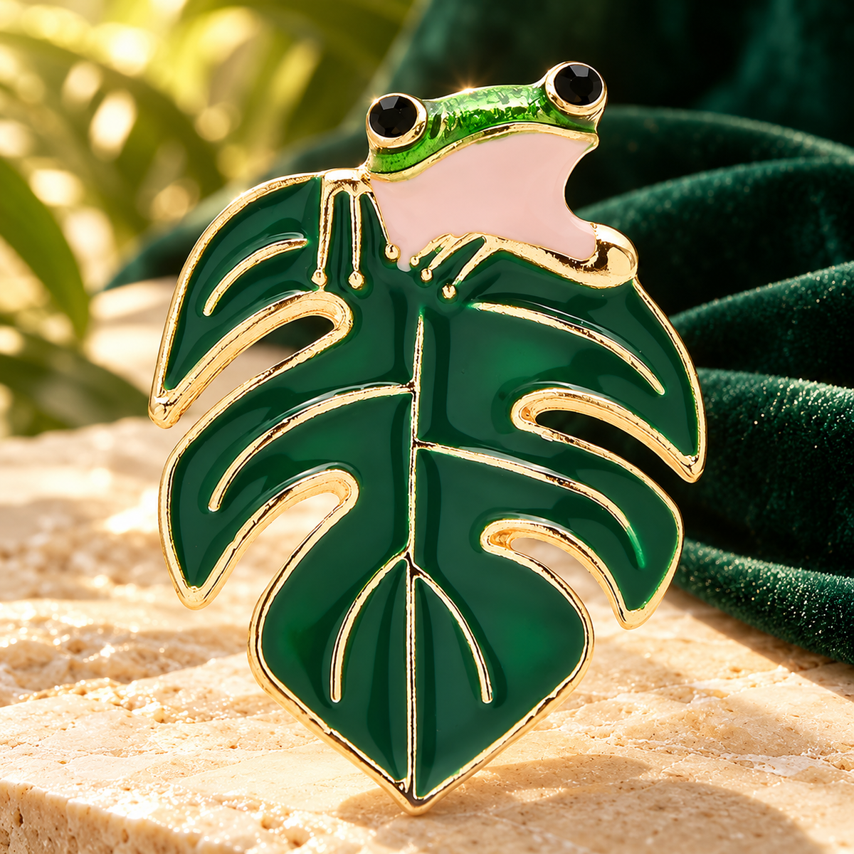 Enamel Frog on Monstera Leaf Brooch — styled background