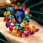 Jeweled Teardrop with Marquise Leaf Spray Brooch — styled background