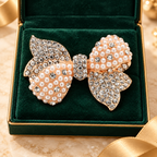 Pearl-Look Rhinestone Bow Brooch — styled background