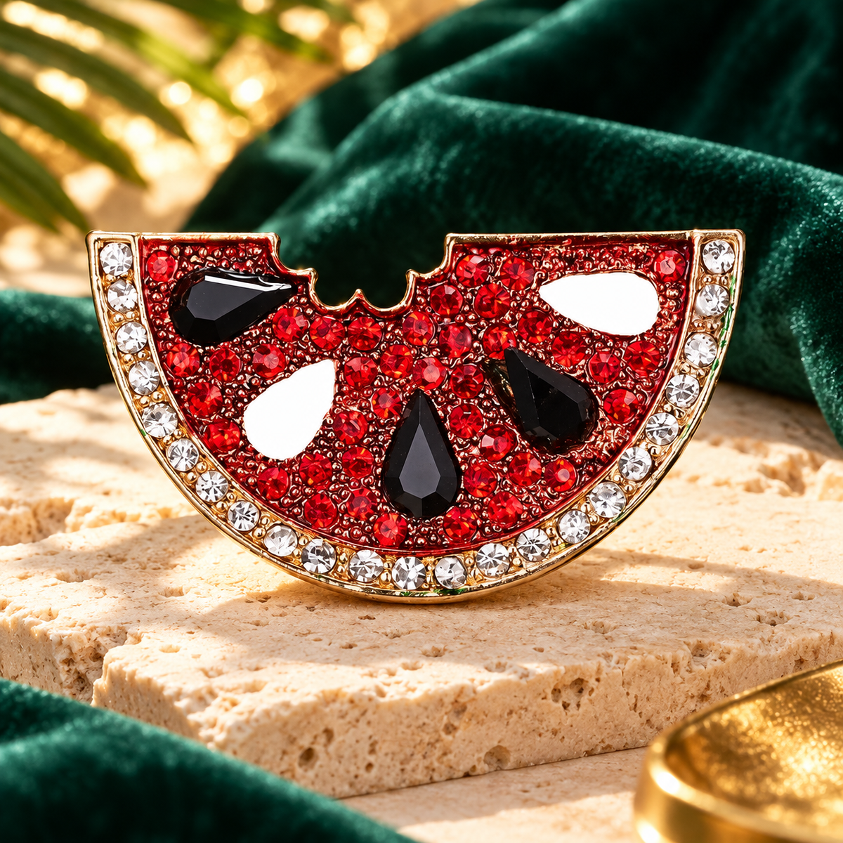 Red Rhinestone Watermelon Slice Brooch — styled background