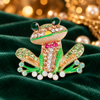 Smiling Jeweled Frog Brooch — styled background