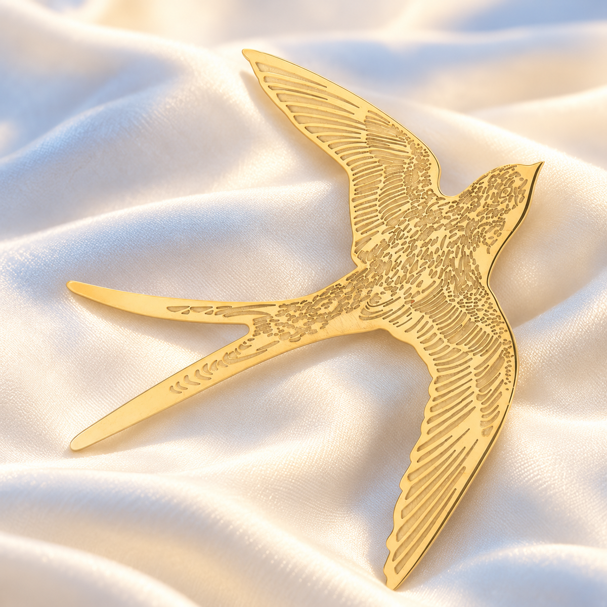 Etched Swallow Silhouette Brooch — styled background