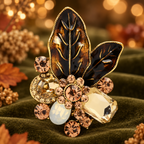 Jeweled Botanical Leaf Cluster Brooch — styled background