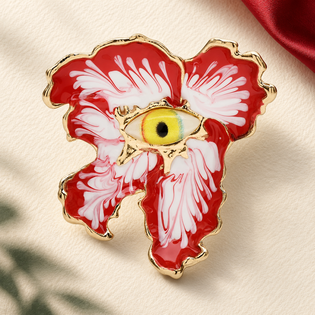 Surreal Enamel Eye Flower Brooch — styled background
