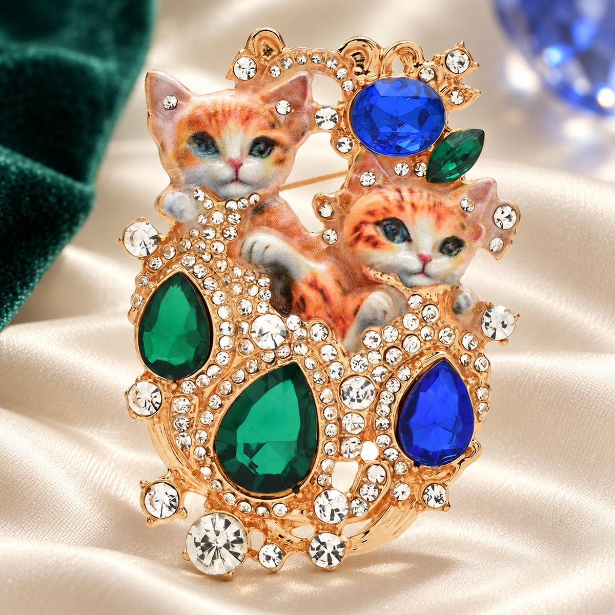 Ornate Jeweled Cat Pair Brooch — styled background