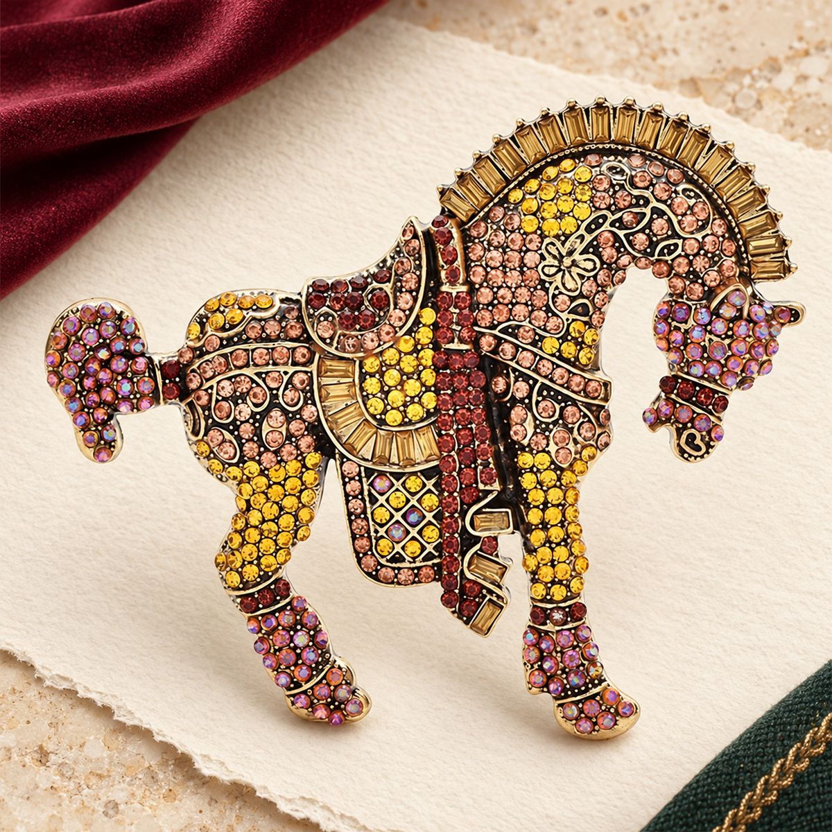 Ornate Rhinestone Horse with Decorative Saddle Brooch — styled background