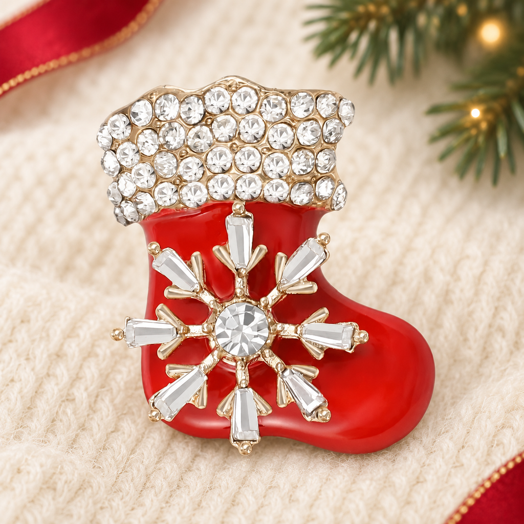 Enamel Christmas Stocking with Snowflake Brooch — styled background