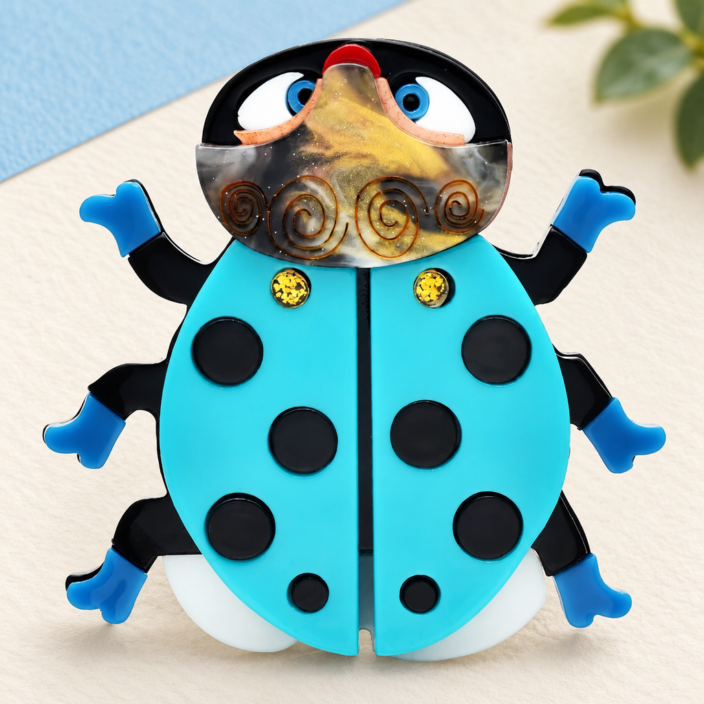 Blue Spotted Acrylic Ladybug Brooch — styled background