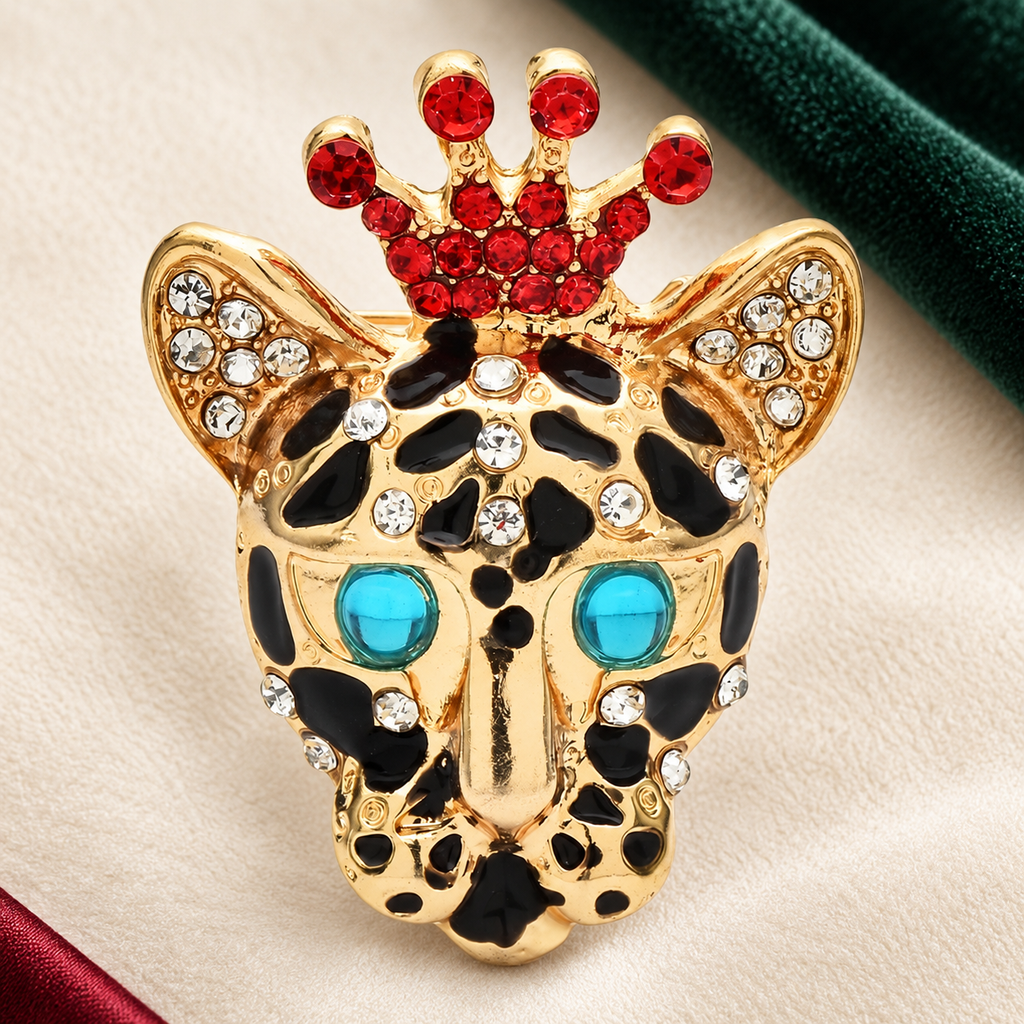 Crowned Rhinestone Spotted Cat Brooch — styled background