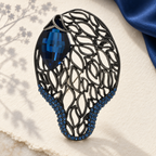 Openwork Leaf with Faceted Accent Brooch — styled background