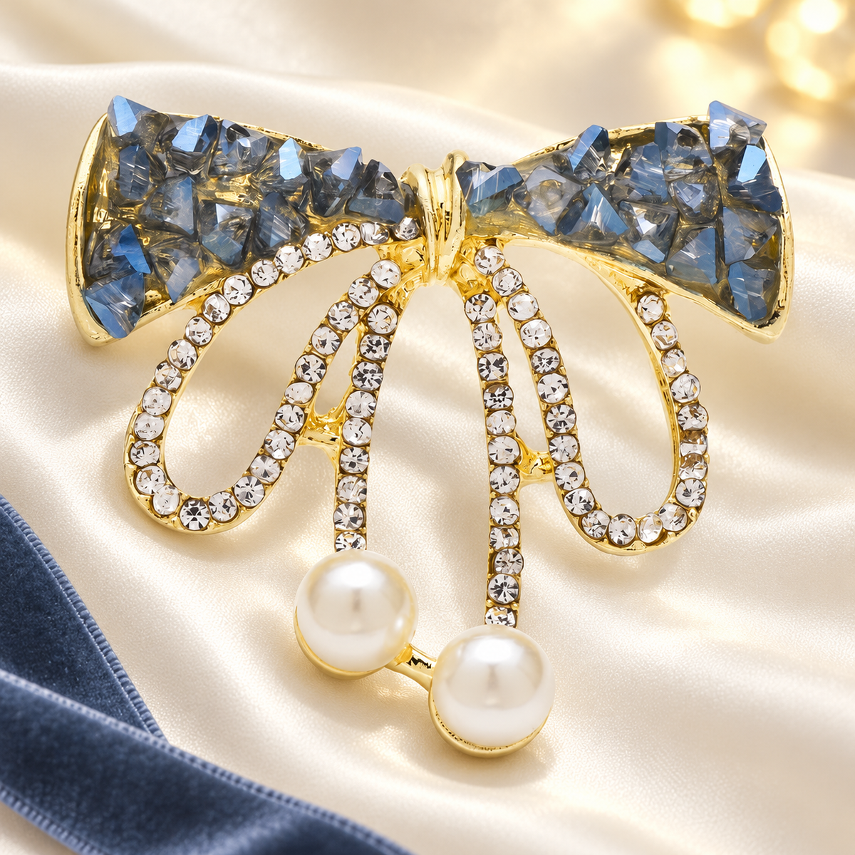Jeweled Ribbon Bow with Twin Pearl-Look Drops Brooch — styled background