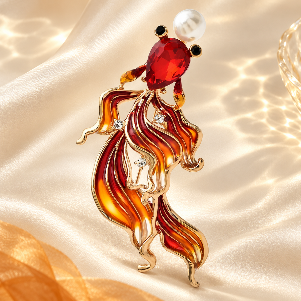 Enamel Flowing-Tail Goldfish Brooch — styled background