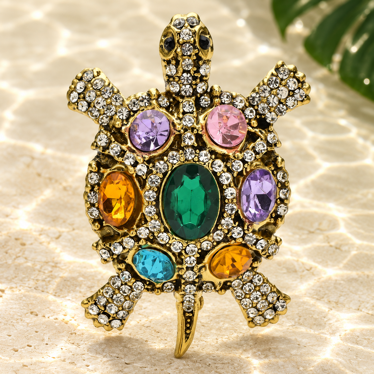 Vintage Jeweled Turtle with Oval Shell Brooch — styled background