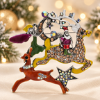 Christmas Reindeer and Star Wreath Brooch — styled background