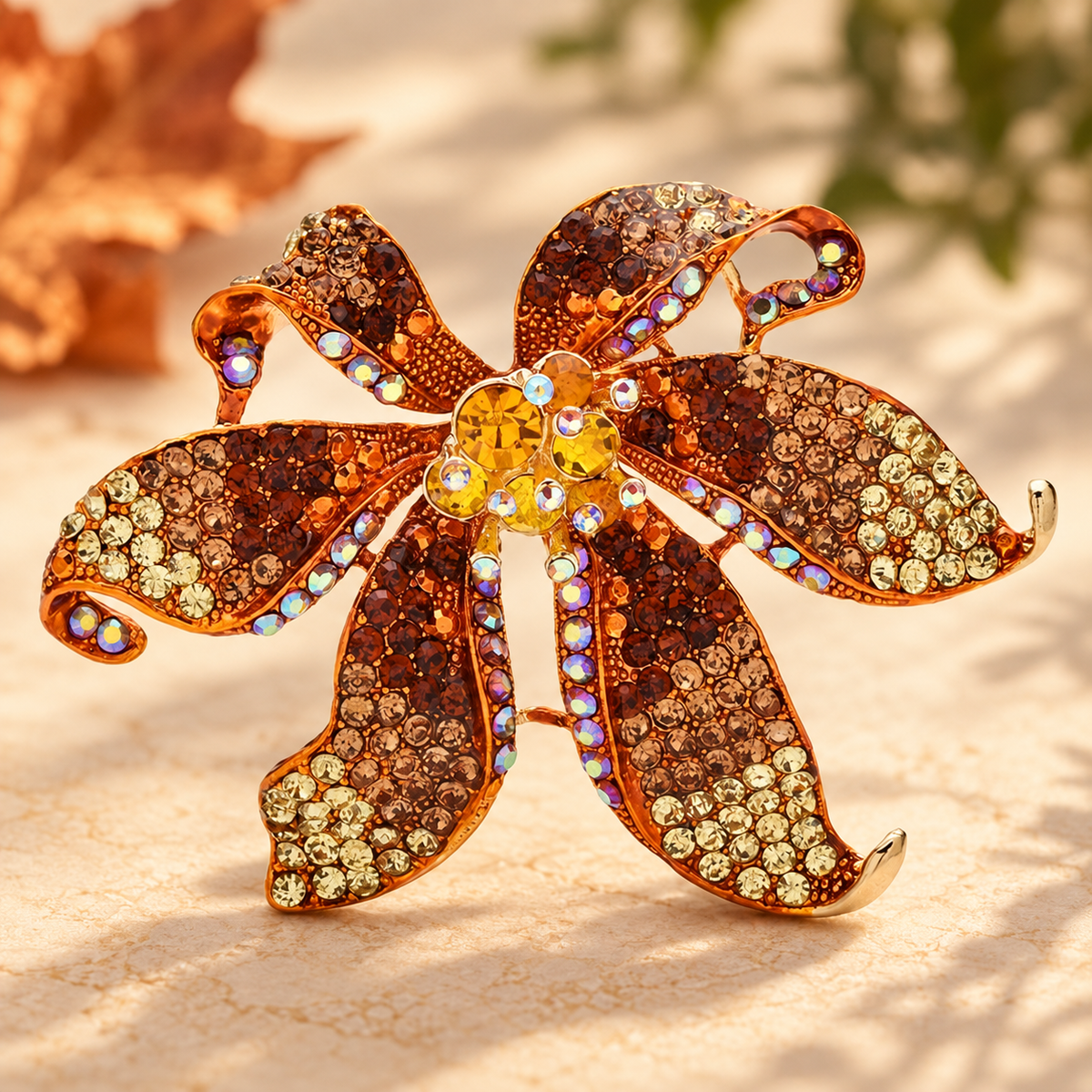 Large Rhinestone Flower with Curved Petals Brooch — styled background