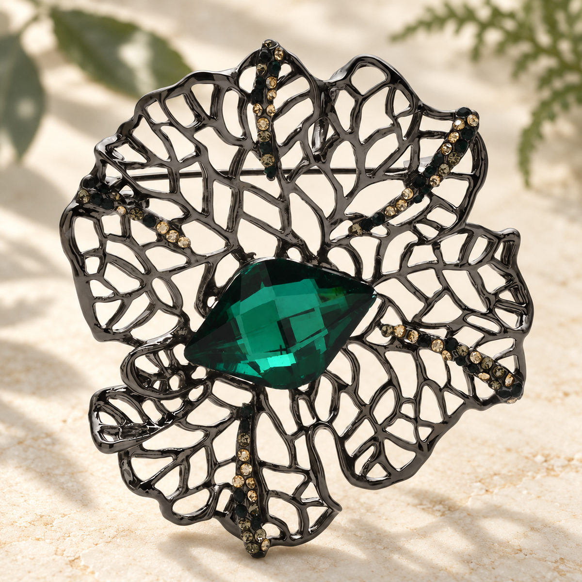 Openwork Flower with Faceted Oval Center Brooch — styled background