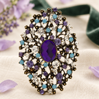 Oval Rhinestone Medallion with Faceted Center Brooch — styled background