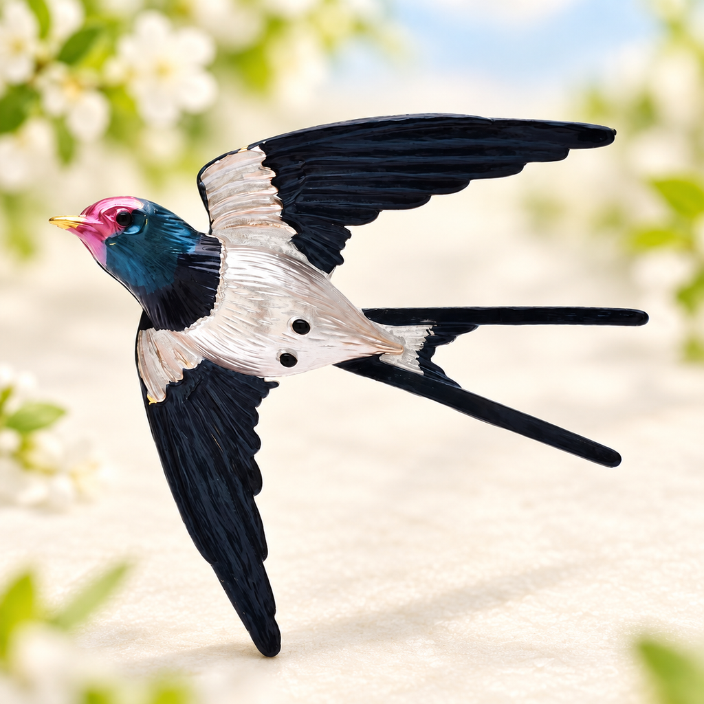 Enamel Flying Swallow with Forked Tail Brooch — styled background