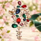Jeweled Butterfly and Flower Spray Brooch — styled background